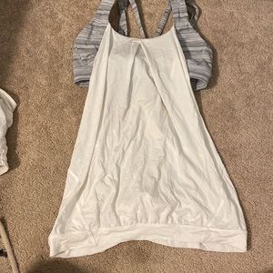 sports bra type top with flowy white tank built over. Lululemon.